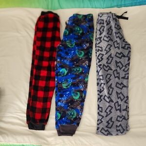 3 Pairs Of Kids Pajama Bottoms. Size Large 10/12